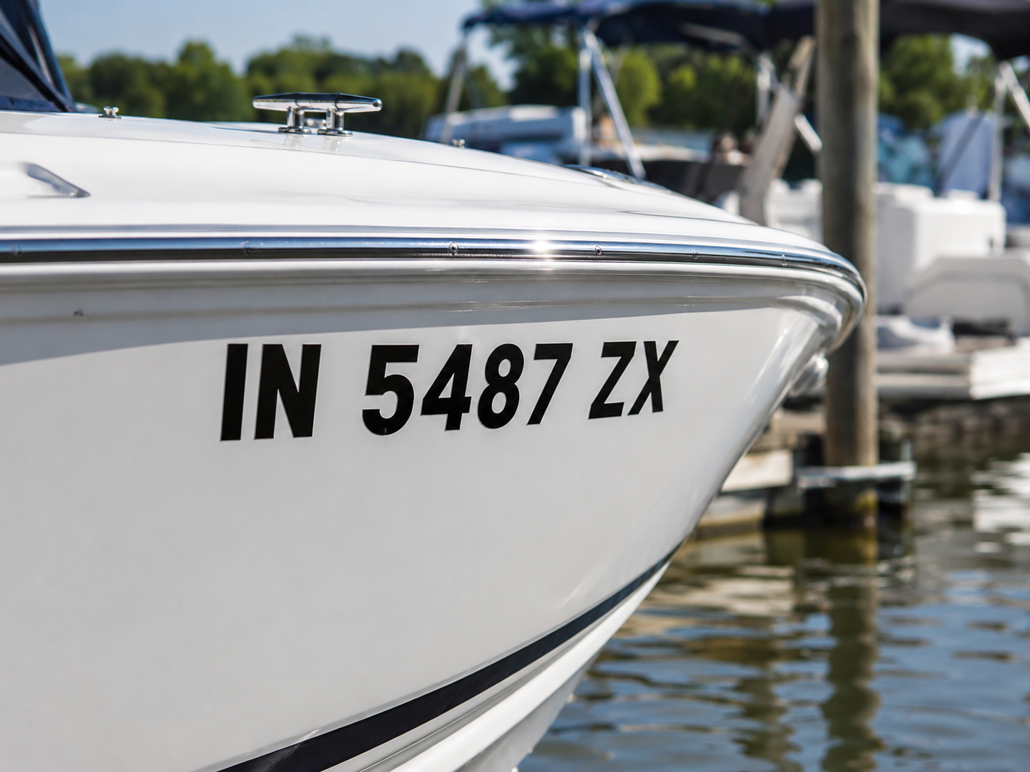 Boat bow with state registration number decals