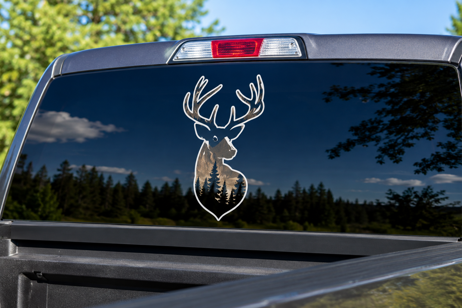 Custom vinyl sticker on a truck rear window outdoors